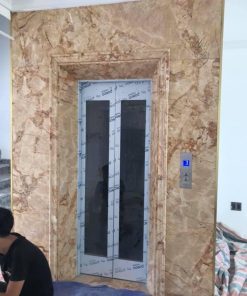 Đá ốp thang máy marble Sky Gold